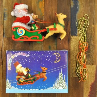 &Ocirc;ng Gi&agrave; Noel Tr&ecirc;n Xe K&eacute;o C&oacute; Nhạc (2 chiếc)